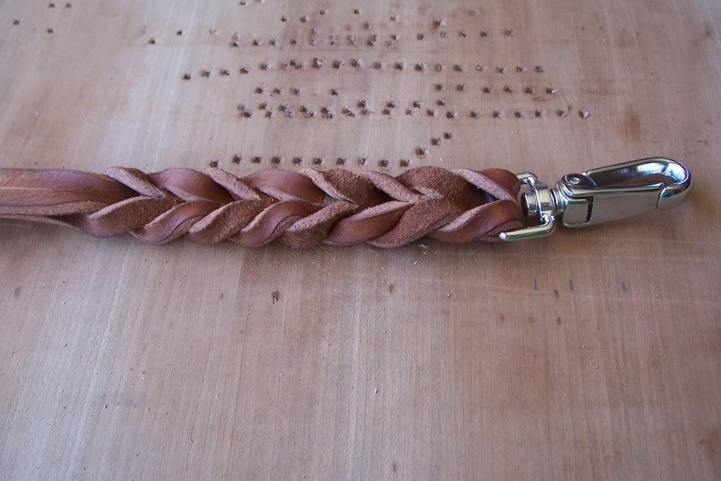 A picture tutorial of homemade leather leashes with braided ends